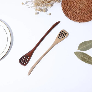 Cuillère trouée en bois pour le miel ou pour bien remuer