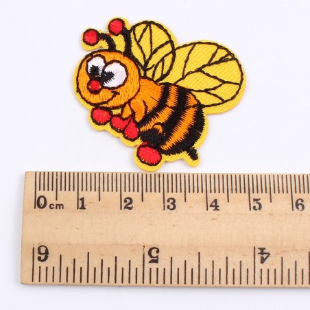 taille patchs abeille de dessin animé de coloris jaune et rouge
