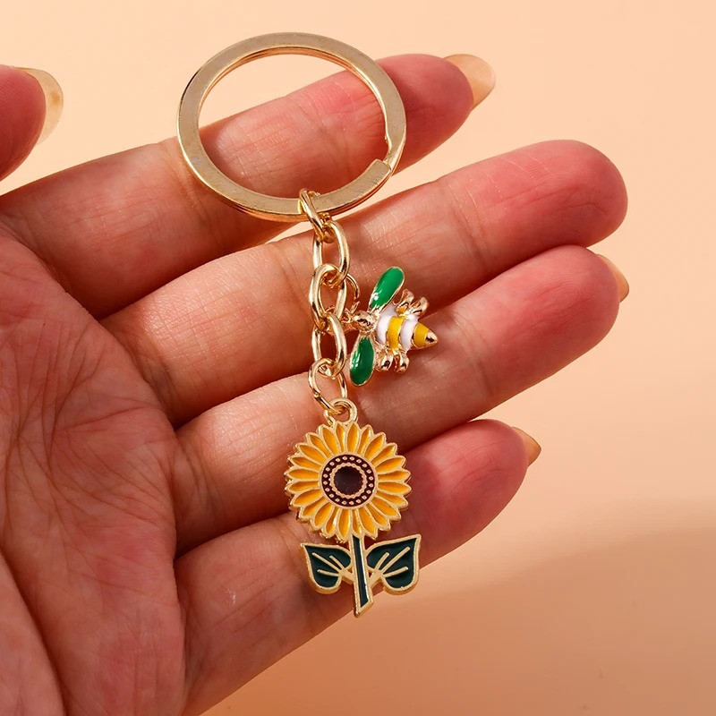 Llavero Abeja y Girasol Dorado – Joyería Original y Elegante