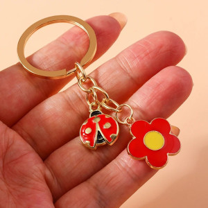 Llavero Mariquita y Flor Encantada - Accesorio Elegante y Original