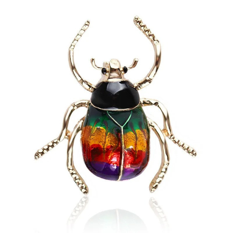 Broche Escarabajo Cometa Original – Joya Cósmica (3 Colores)