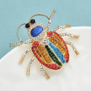 Broche Escarabajo Arcoíris – Joya Multicolor Brillante