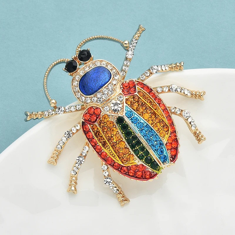 Broche Escarabajo Arcoíris – Joya Multicolor Brillante