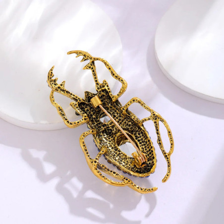Broche Escarabajo Gema Real – Joya Dorada Rubí o Zafiro