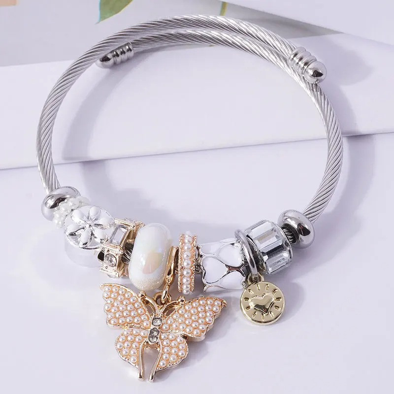 Pulsera Mariposa Perlada Elegancia con Perlas y Cristales