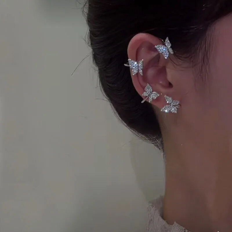 Boucles d'oreilles papillon - clip d'oreiles papillons couleur argent et stras