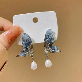 Boucles d'oreilles papillon avec perle