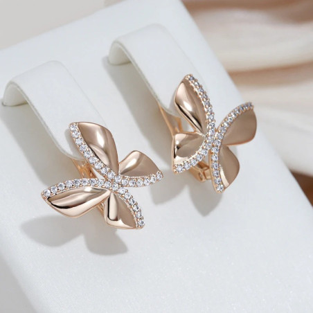 détails des Boucles d'oreilles papillon en or rose