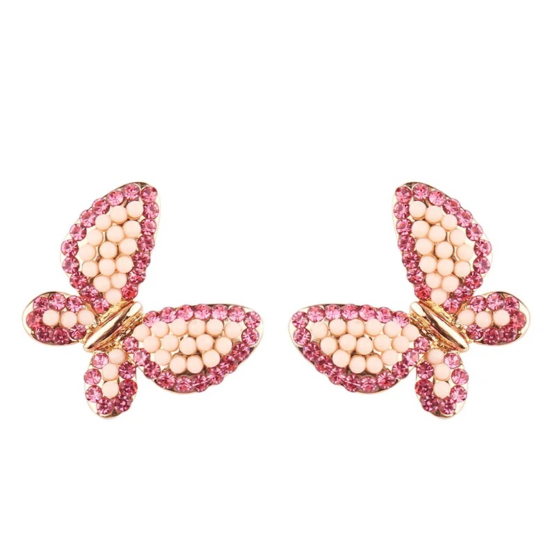 Petites boucles d'oreilles papillons scintillants - couleur rose
