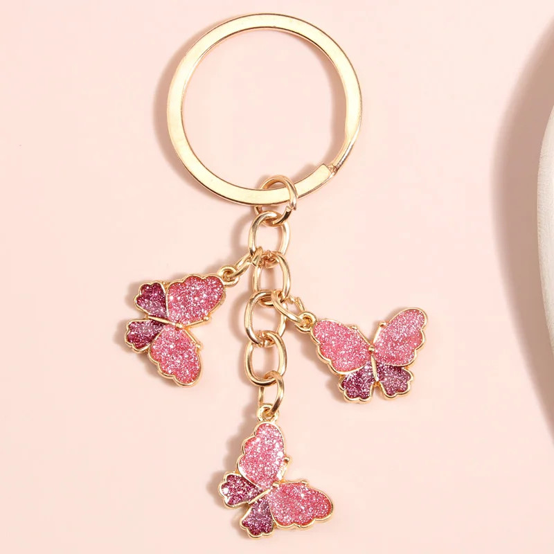 Porte-clés papillon en verre - couleur rose