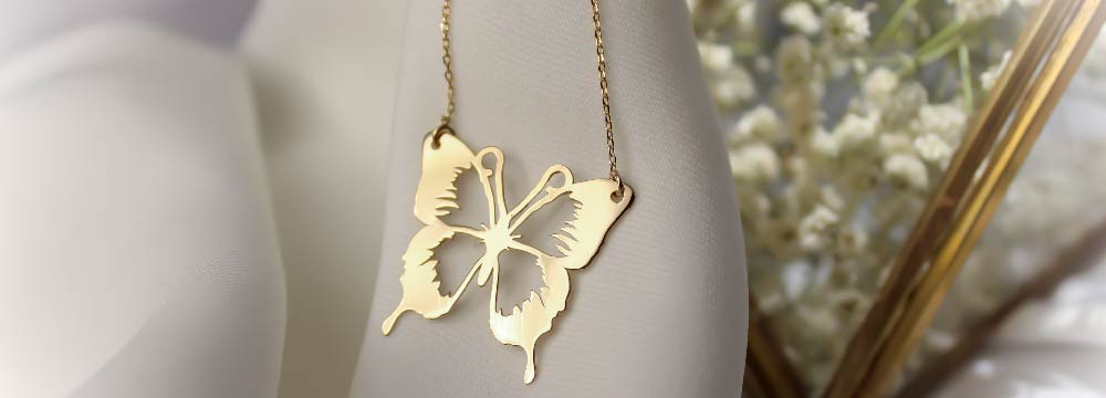 Collar mariposa, colgantes nature y joya simbolica